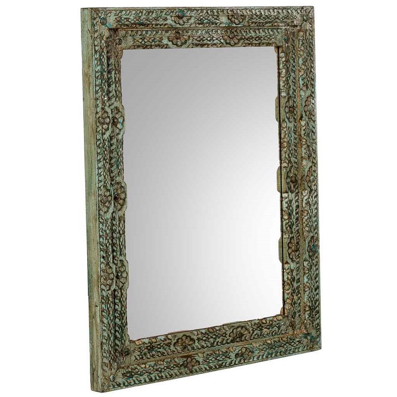 Espejo decorado con tallados en verde